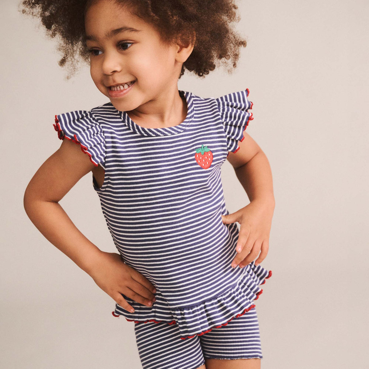 INK STRIPE RIB PEPLUM TEE