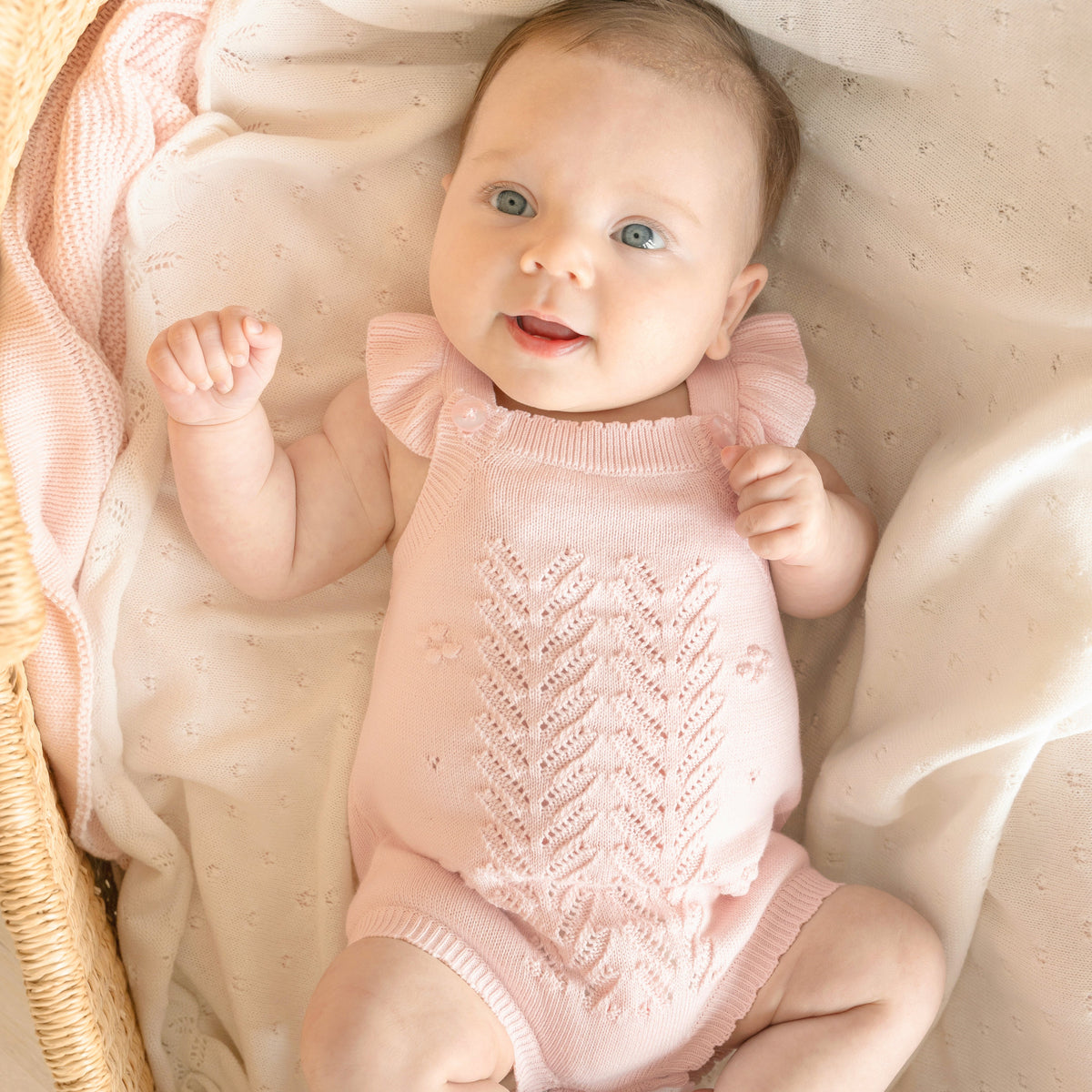 ORGANIC PINK BOBBLE KNIT BODYSUIT