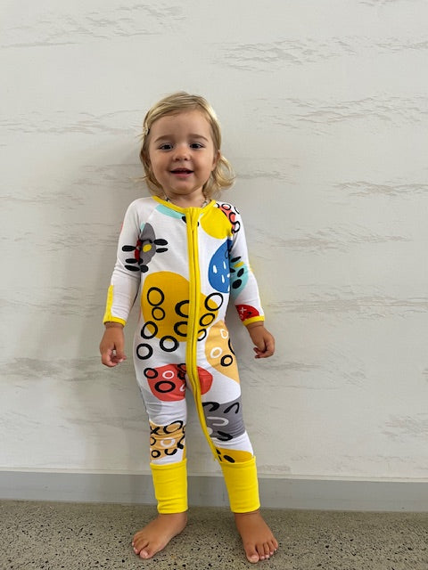 Pebbles Print Onesie with Dandelion Trim