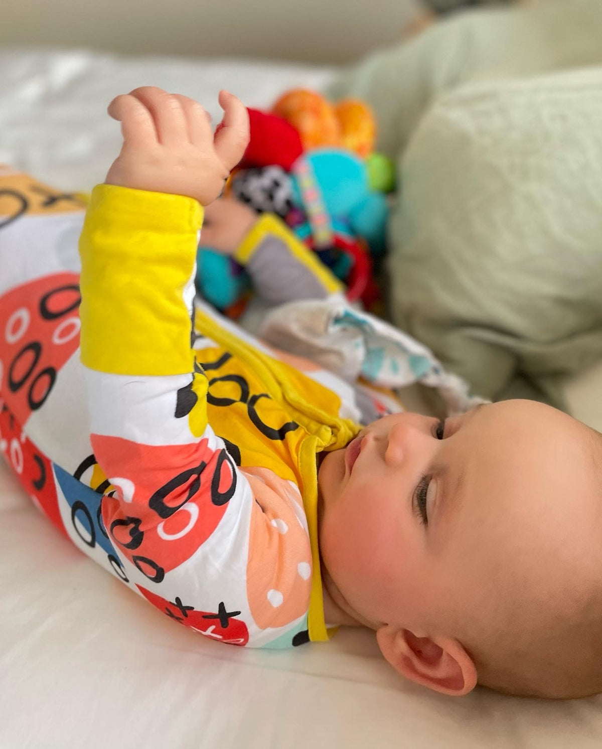 Pebbles Print Onesie with Dandelion Trim