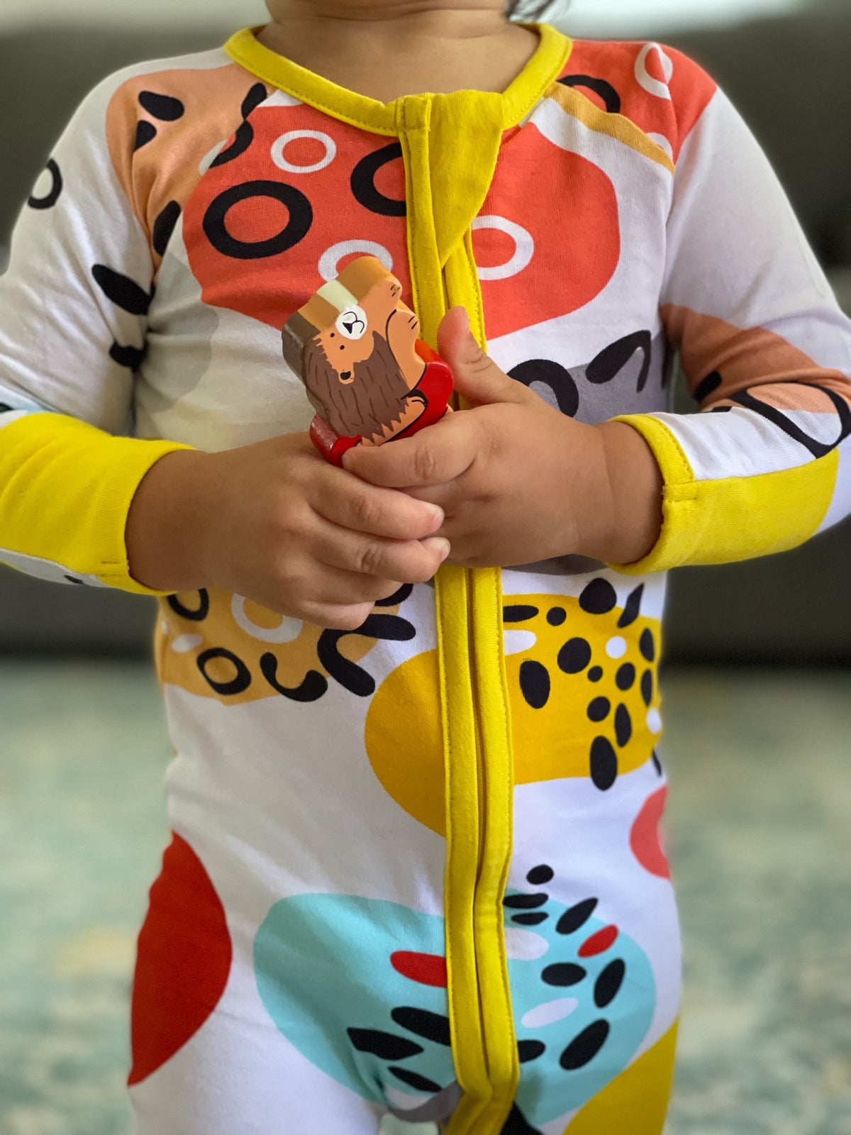 Pebbles Print Onesie with Dandelion Trim